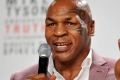 Video: Mike Tyson Chops It Up With Evander Holyfield Over Controversial Ear Bite